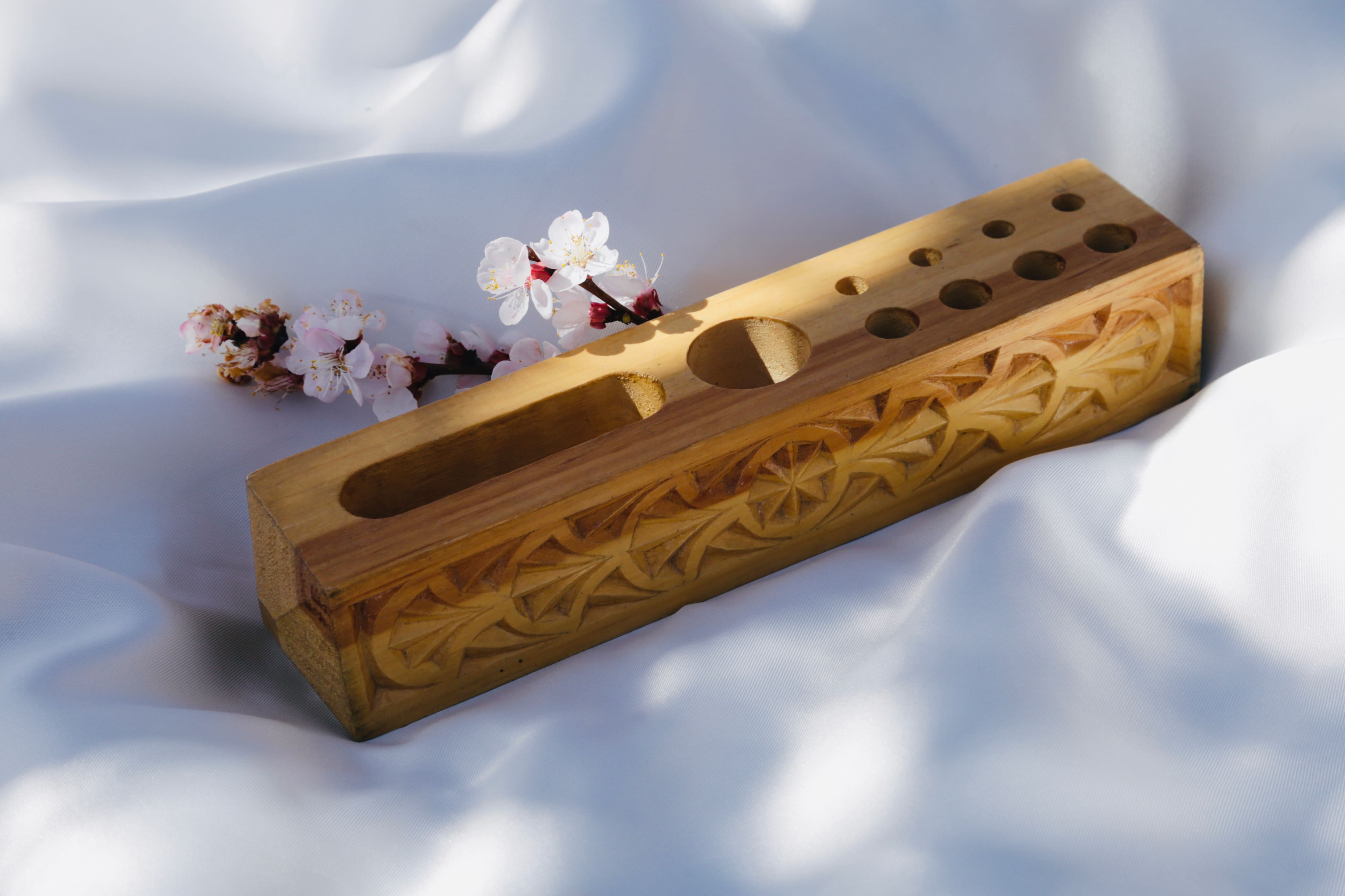 Carved wooden pen holder