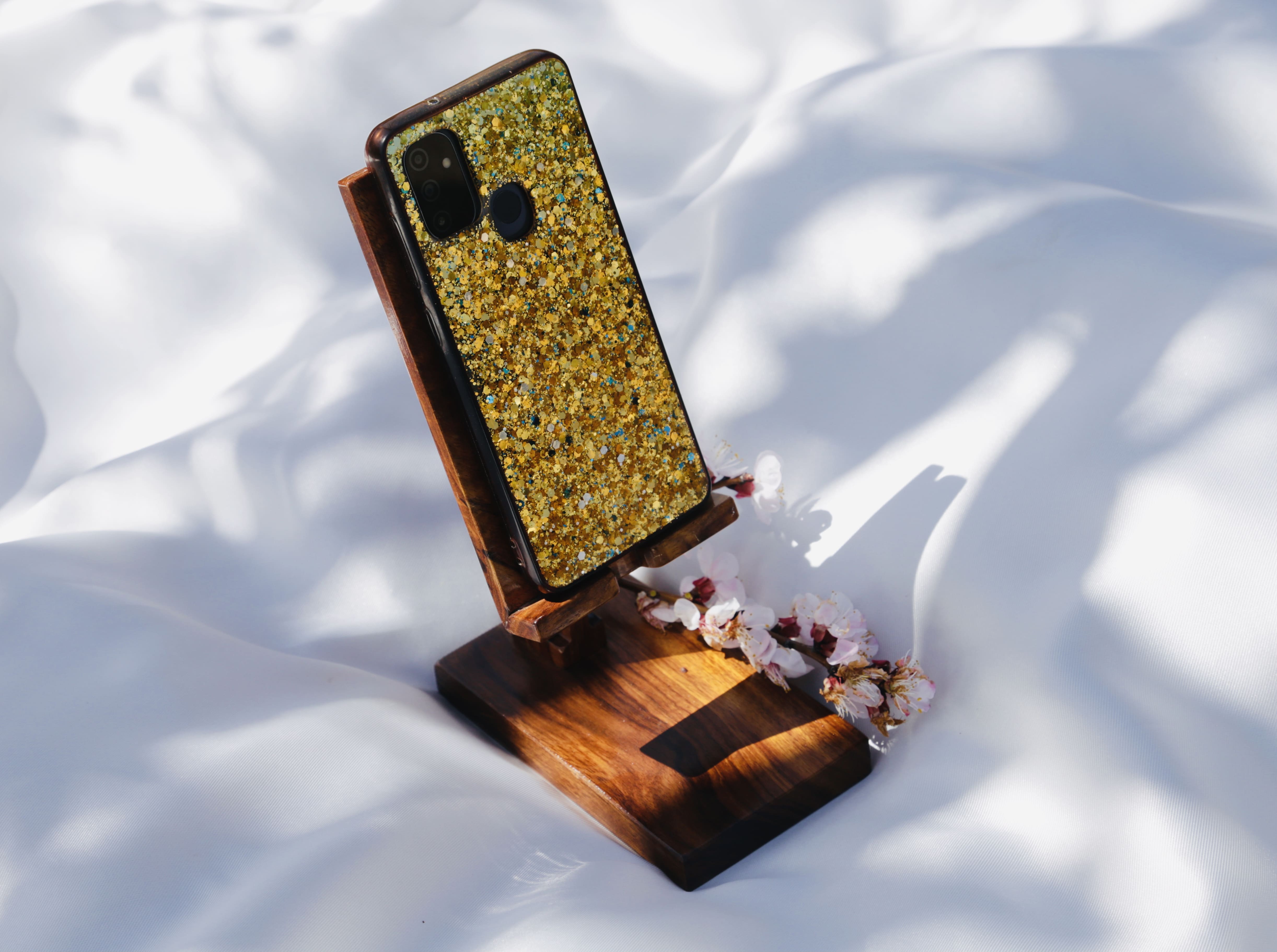 Carved wooden phone stand