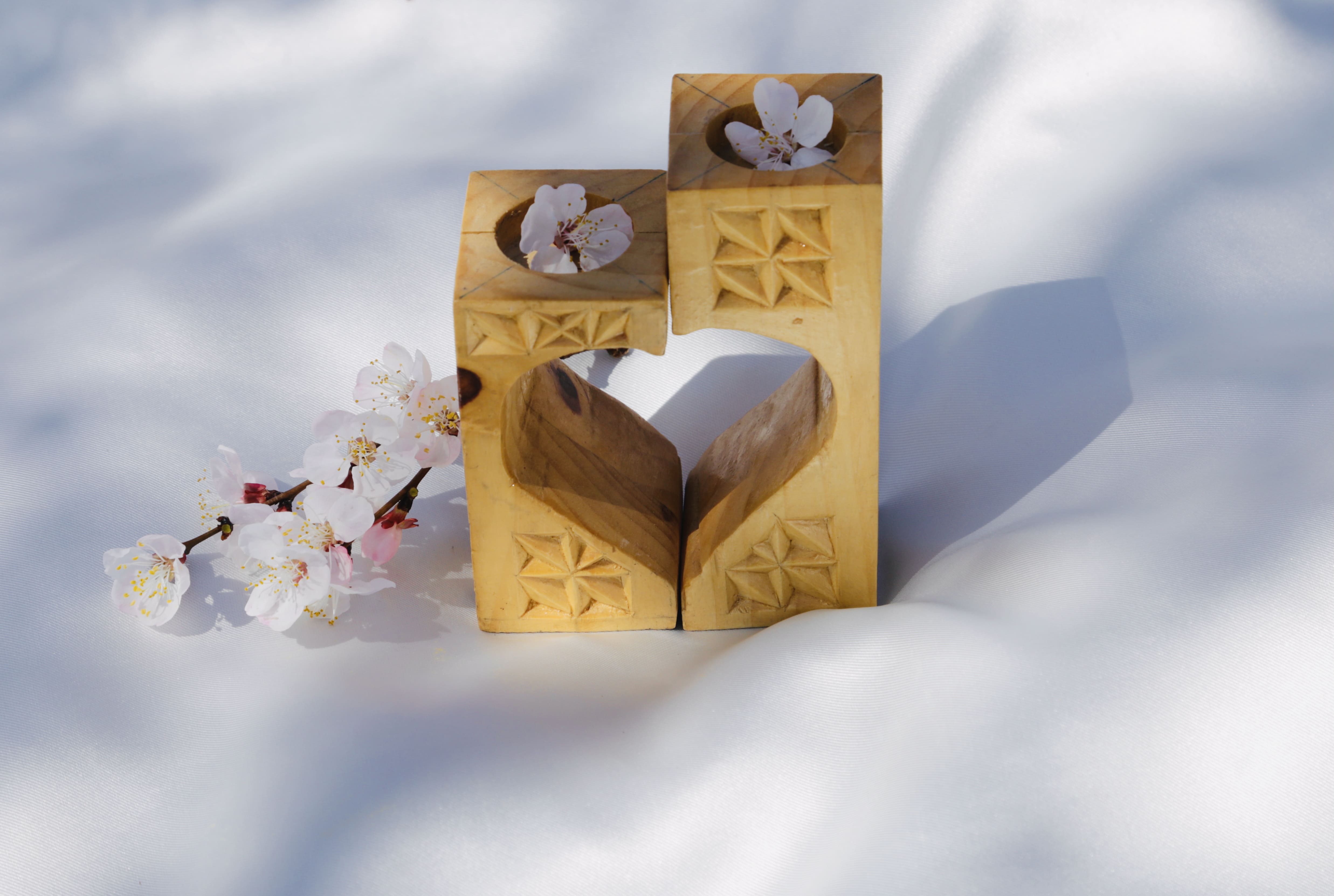 Carved wooden candle holder