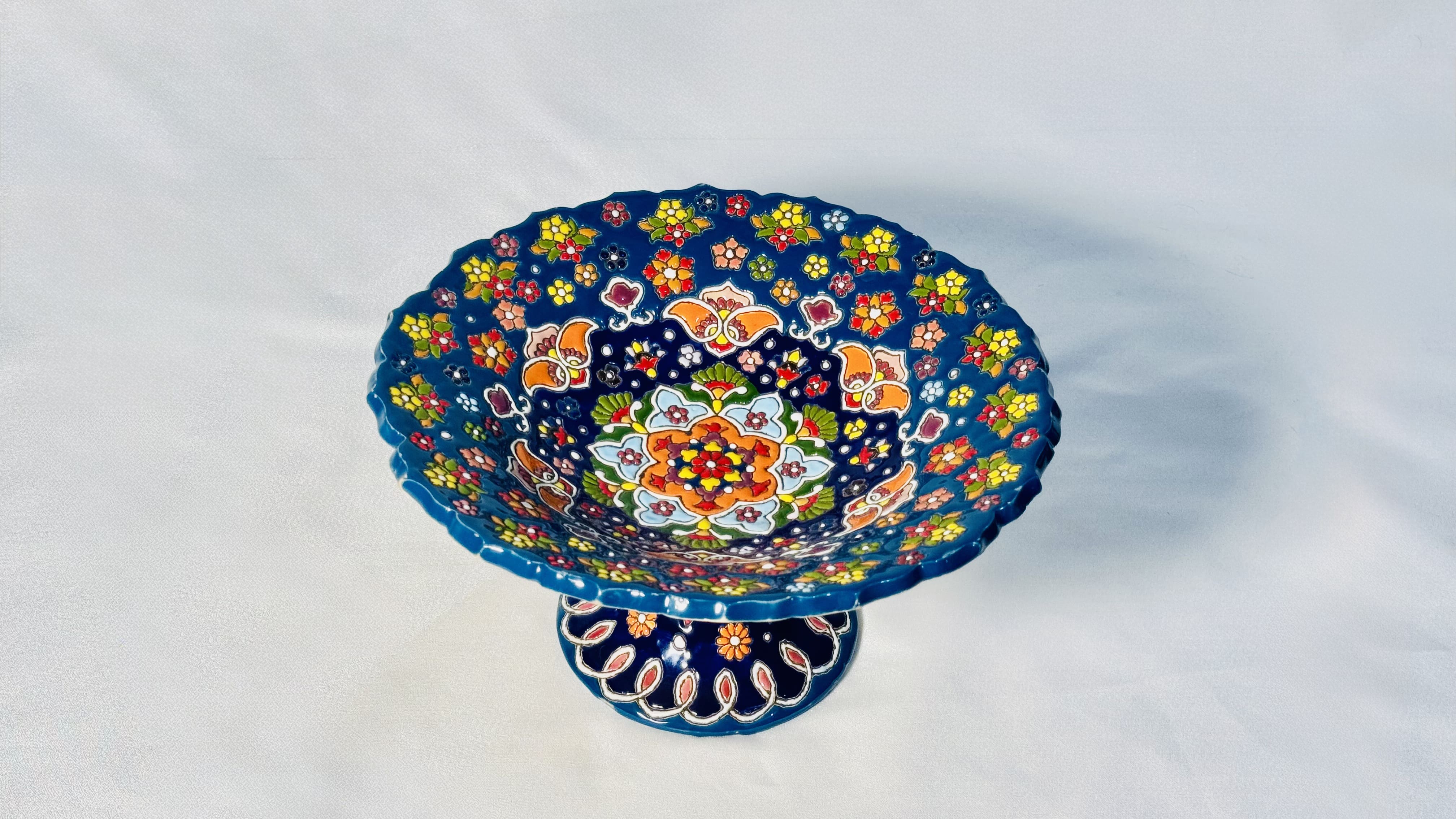 Enameled pottery fruit eating