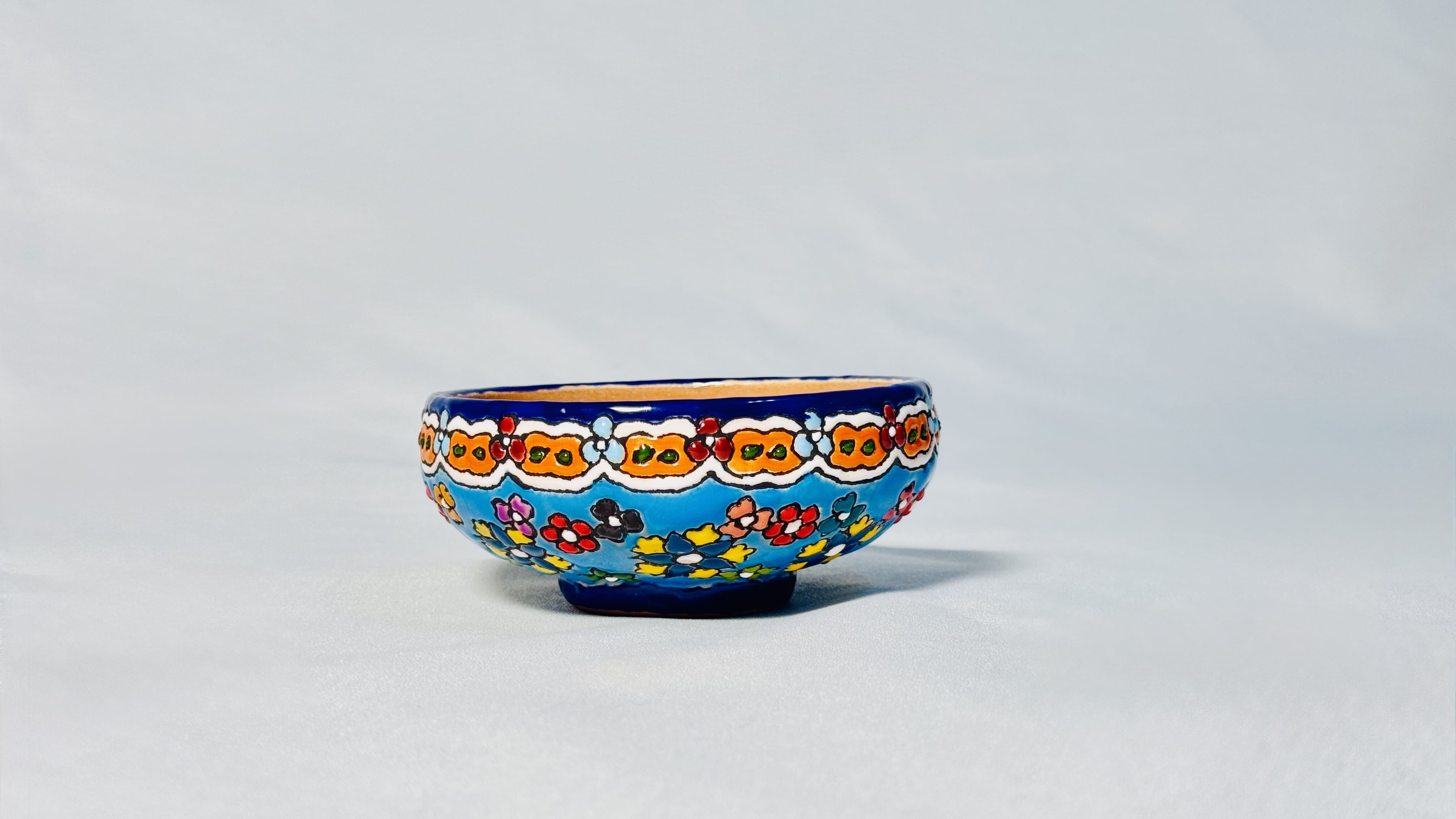 Enameled pottery bowl