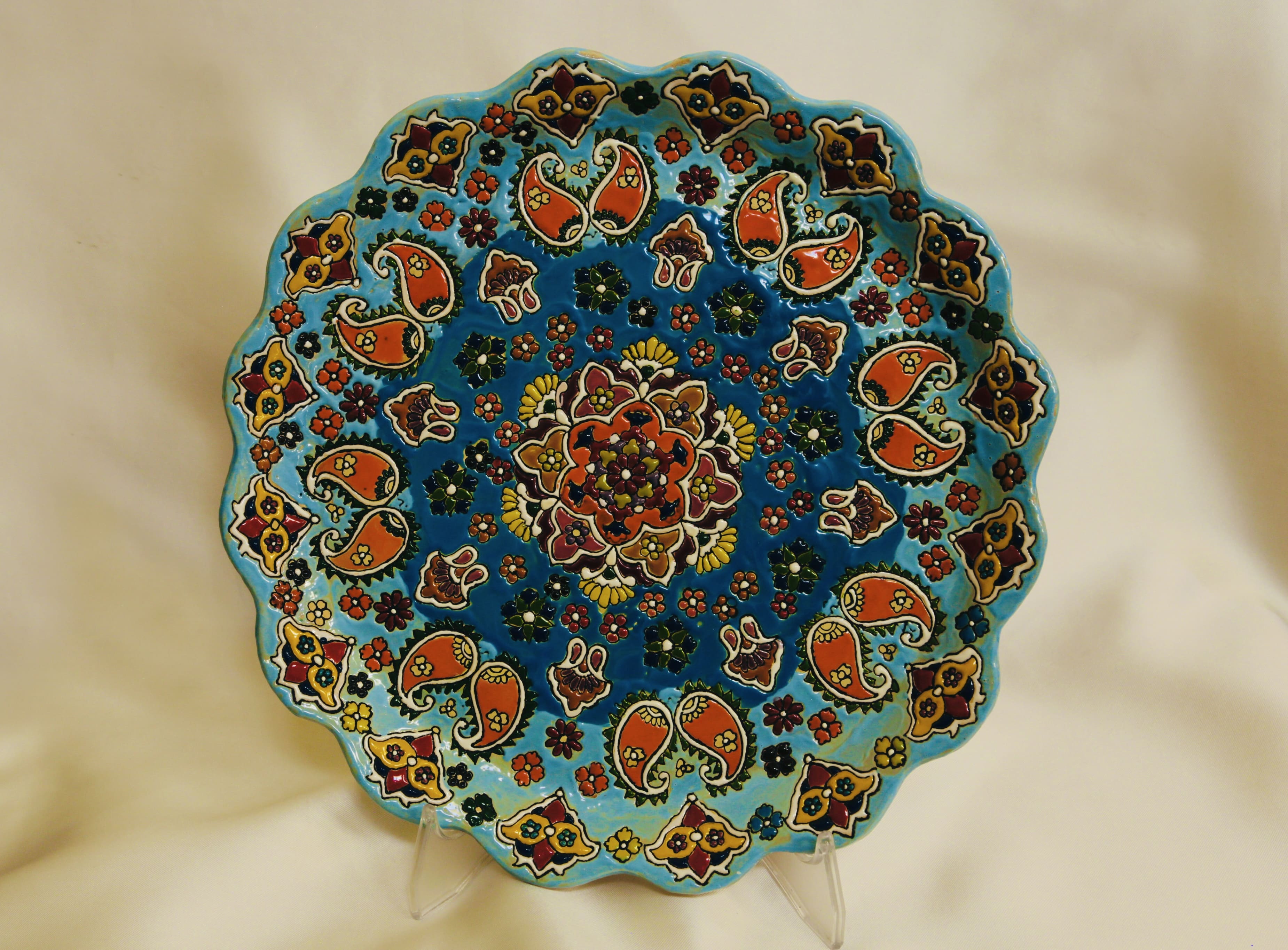 Enameled pottery plate
