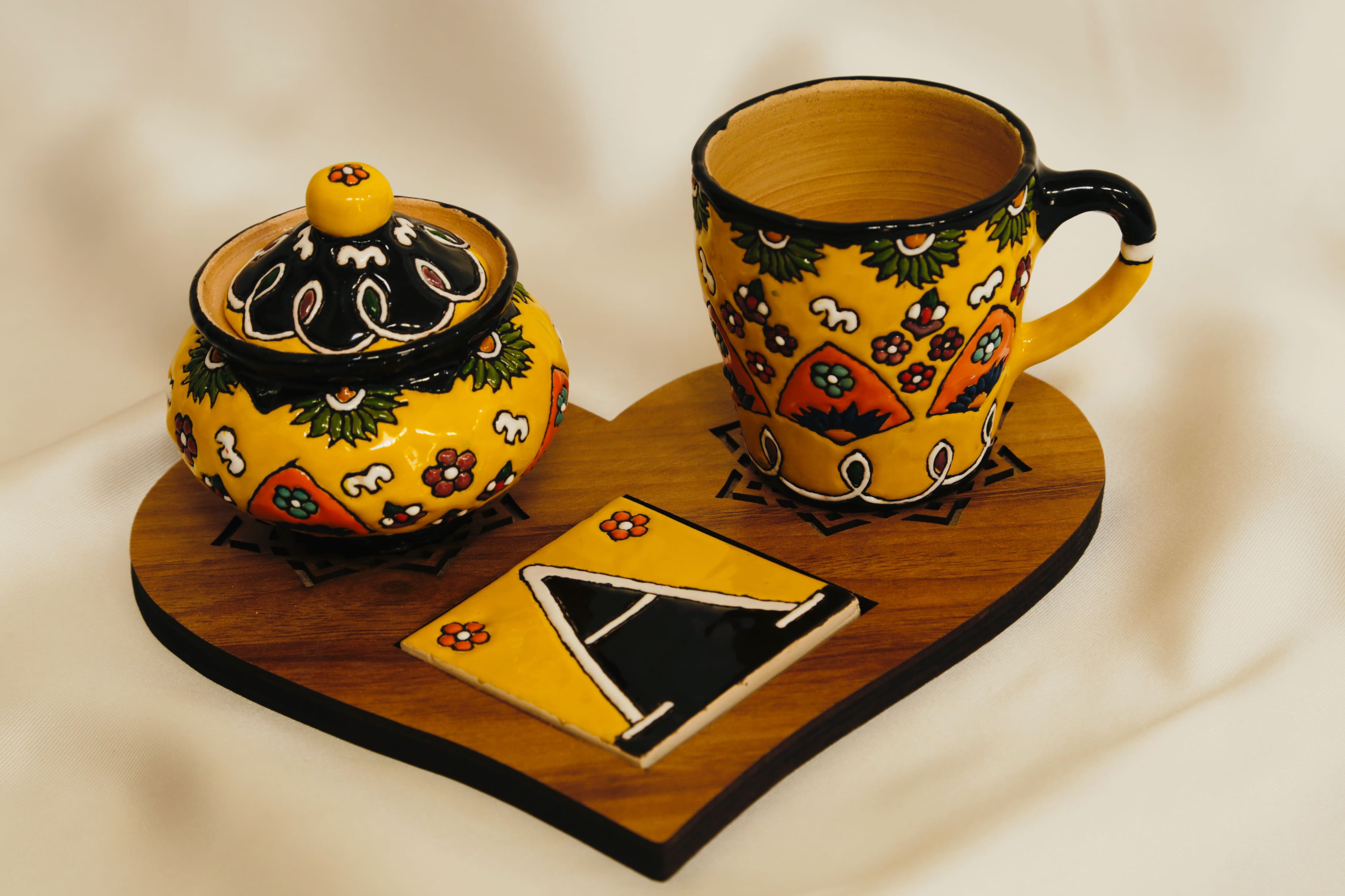 Enameled pottery cups