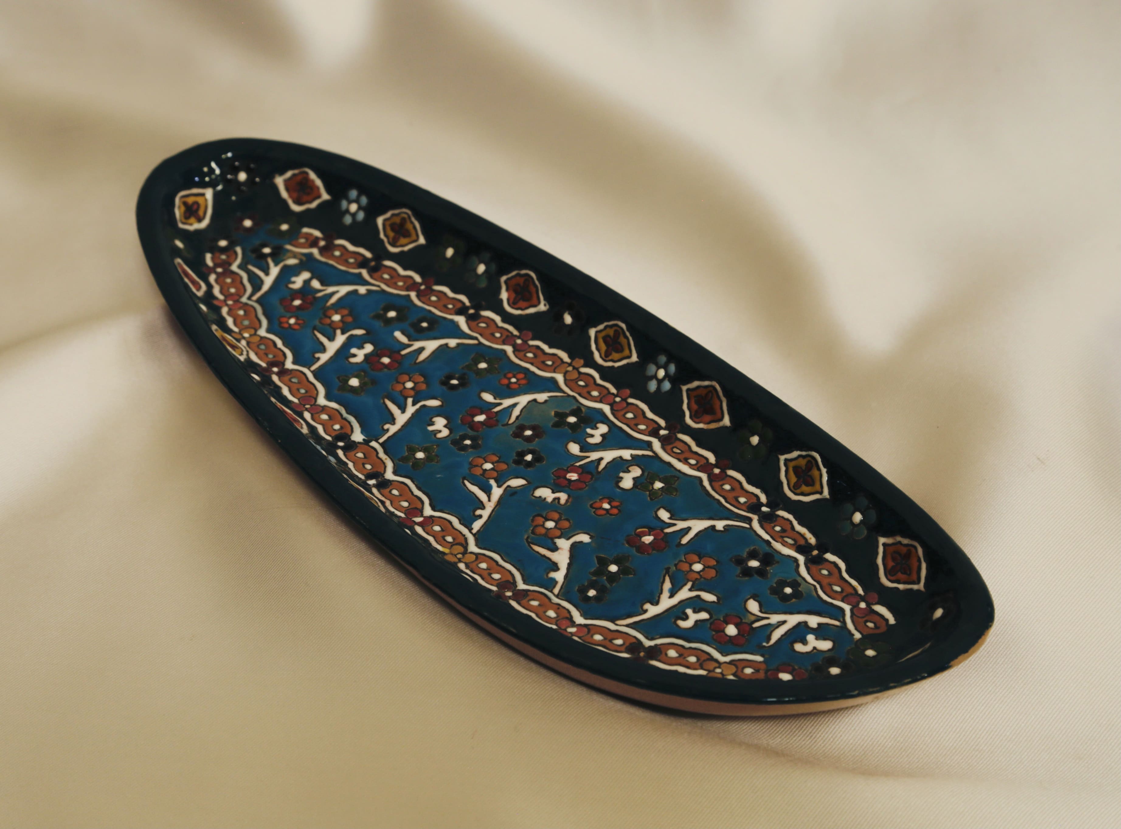 Enameled pottery dish