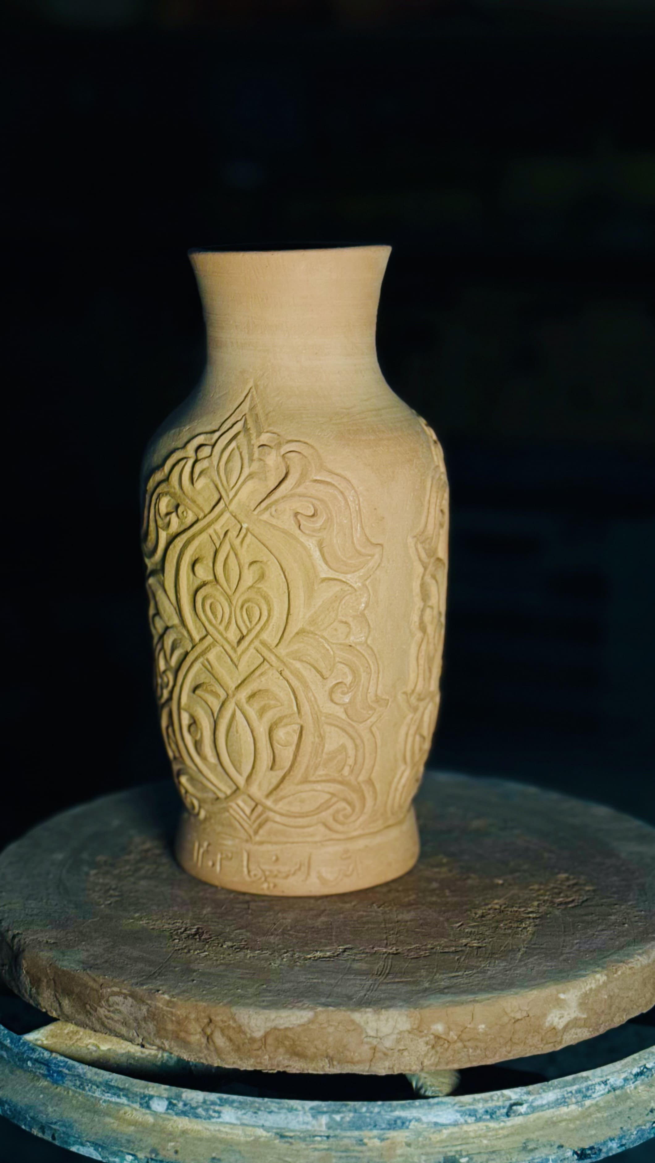 Hand-carved clay flower vase